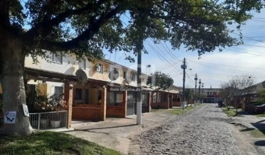 Foto 1 de Sobrado com 2 Quartos à venda, 79m² em Hípica, Porto Alegre