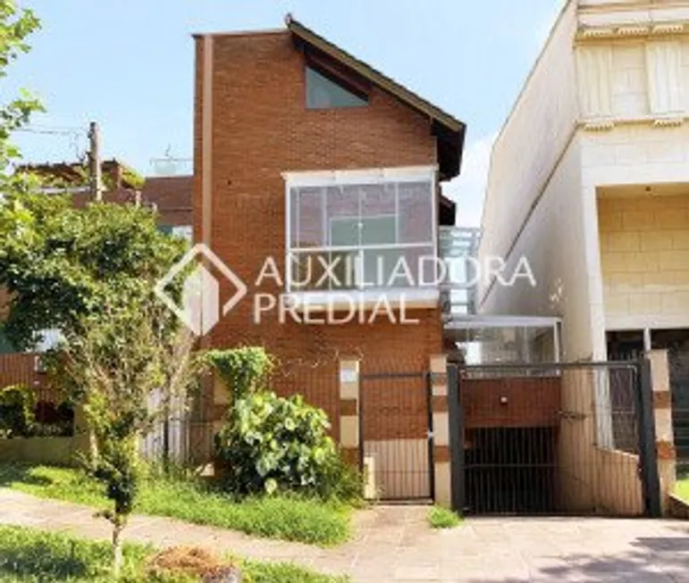 Foto 1 de Casa de Condomínio com 2 Quartos à venda, 174m² em Chácara das Pedras, Porto Alegre