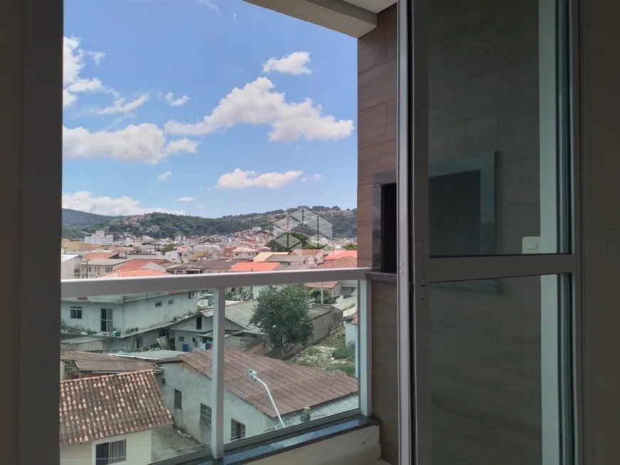 Foto 1 de Apartamento com 2 Quartos à venda, 66m² em Forquilhinhas, São José