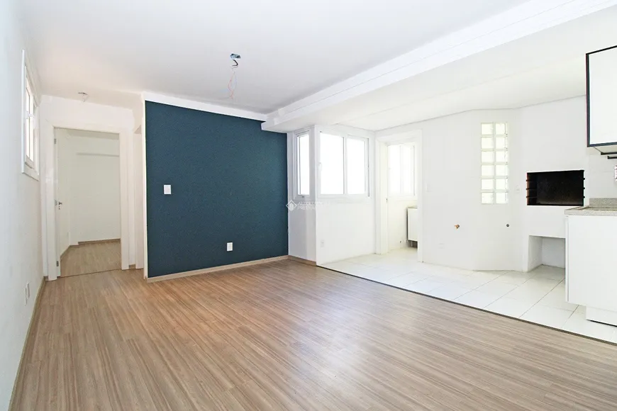 Foto 1 de Apartamento com 1 Quarto à venda, 45m² em Independência, Porto Alegre