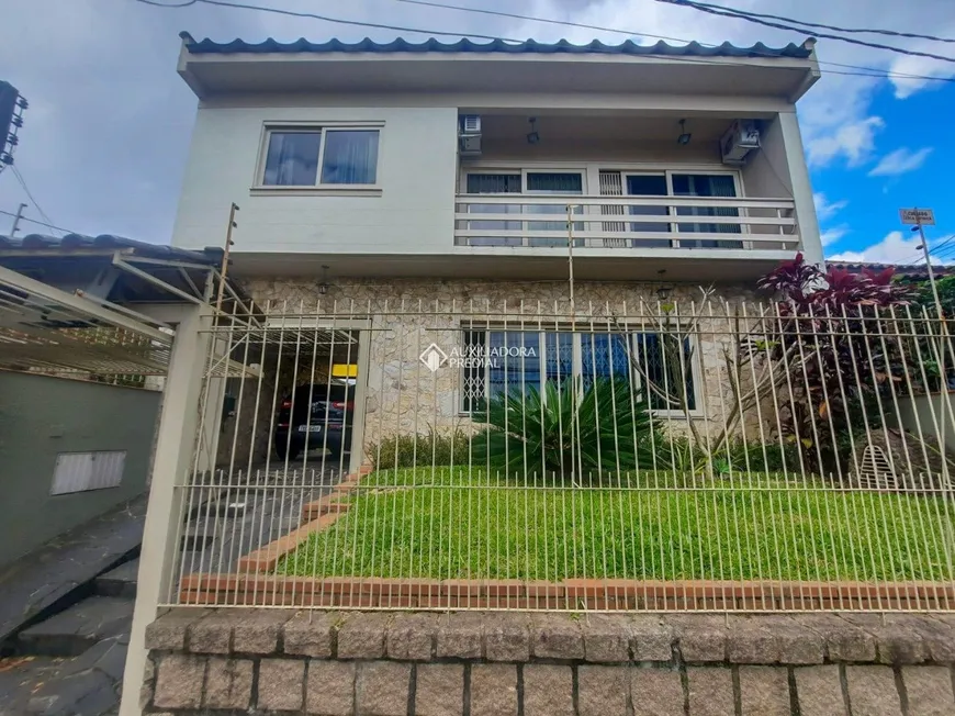 Foto 1 de Casa com 4 Quartos à venda, 250m² em Cavalhada, Porto Alegre