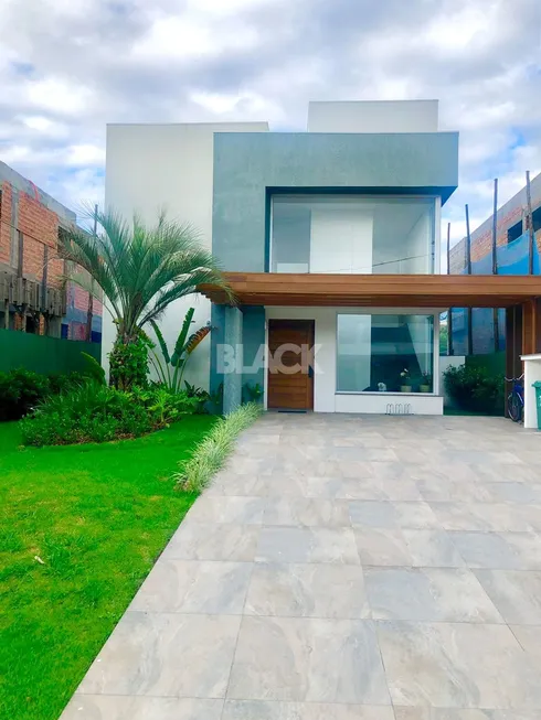 Foto 1 de Casa de Condomínio com 5 Quartos à venda, 238m² em Praia da Cal, Torres