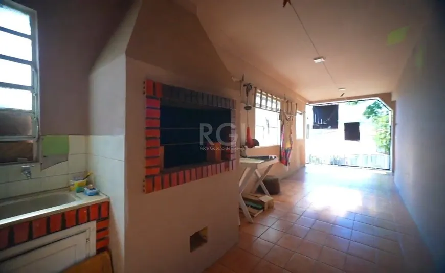 Foto 1 de Casa com 4 Quartos à venda, 199m² em Jardim Carvalho, Porto Alegre