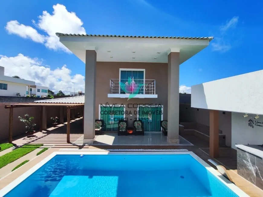 Foto 1 de Casa de Condomínio com 4 Quartos à venda, 400m² em Barra do Jacuípe, Camaçari