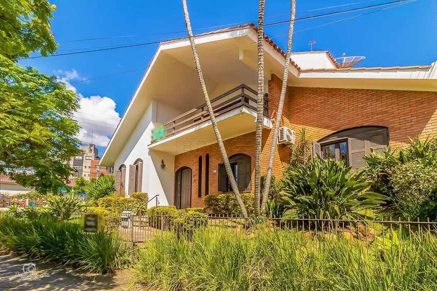Foto 1 de Casa com 6 Quartos à venda, 406m² em Iguatemi, Porto Alegre