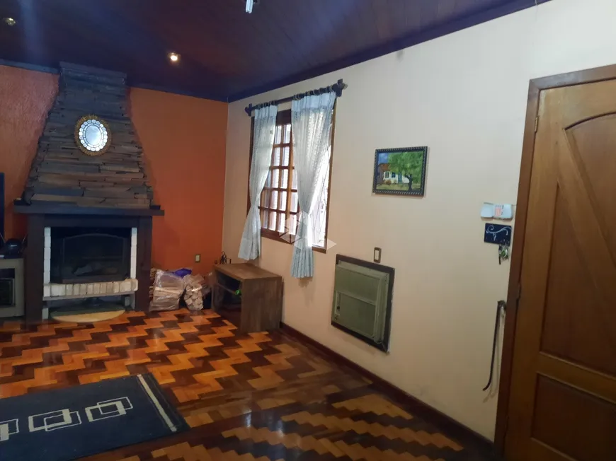 Foto 1 de Casa com 5 Quartos à venda, 198m² em Jardim Botânico, Porto Alegre