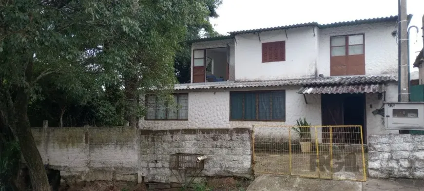 Foto 1 de Casa com 5 Quartos à venda, 199m² em Camaquã, Porto Alegre