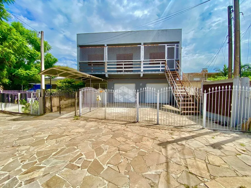 Foto 1 de Casa com 4 Quartos à venda, 309m² em Marechal Rondon, Canoas