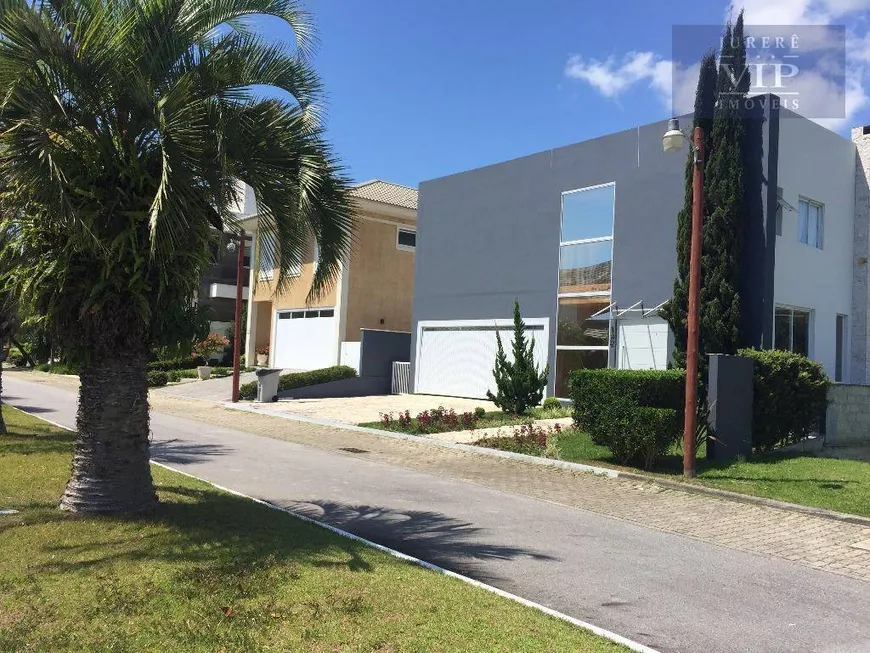 Foto 1 de Casa de Condomínio com 4 Quartos à venda, 470m² em Jurerê, Florianópolis