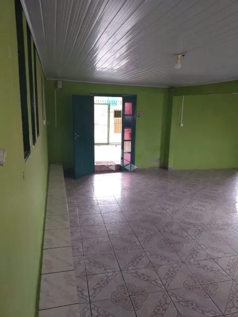 Foto 1 de Casa com 4 Quartos à venda, 200m² em Guajuviras, Canoas