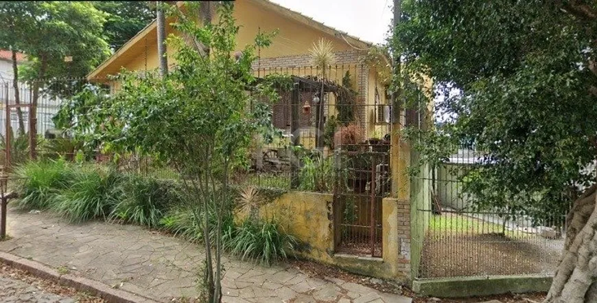 Foto 1 de Casa com 4 Quartos à venda, 374m² em Santa Fé, Porto Alegre
