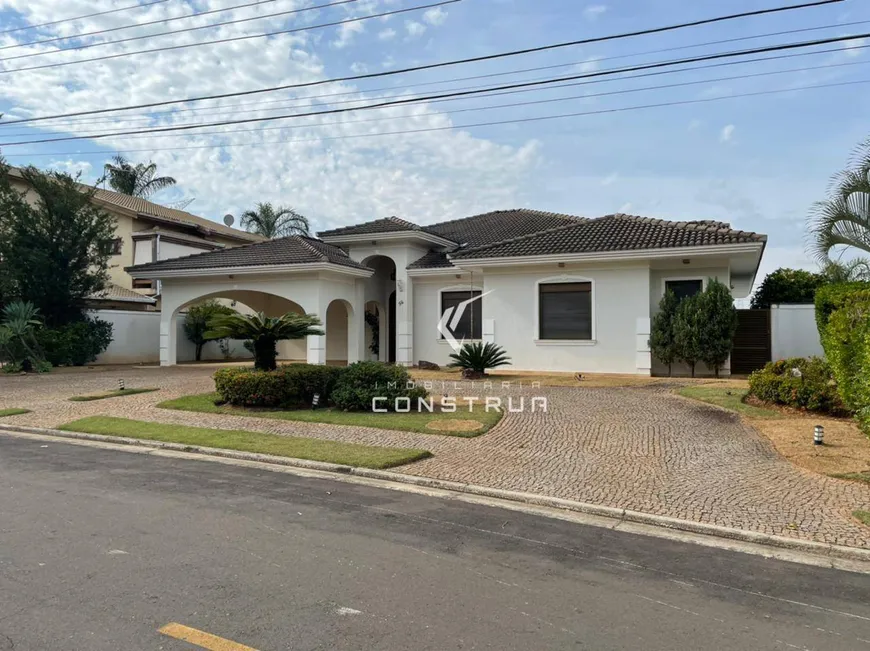 Foto 1 de Casa de Condomínio com 4 Quartos à venda, 384m² em Loteamento Alphaville Campinas, Campinas