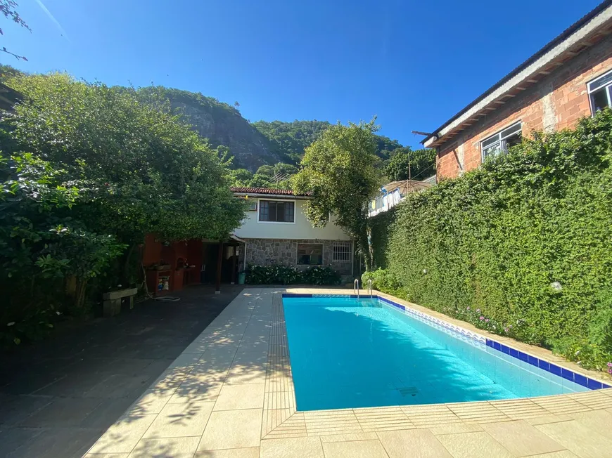 Foto 1 de Casa de Condomínio com 4 Quartos à venda, 316m² em Barra da Tijuca, Rio de Janeiro