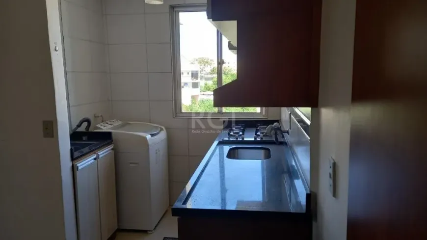 Foto 1 de Apartamento com 2 Quartos à venda, 46m² em Vila Nova, Porto Alegre