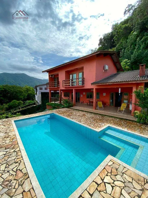 Foto 1 de Casa de Condomínio com 4 Quartos à venda, 432m² em Lagoinha, Ubatuba