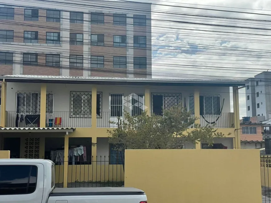 Foto 1 de Casa com 4 Quartos à venda, 180m² em Nacoes, Balneário Camboriú