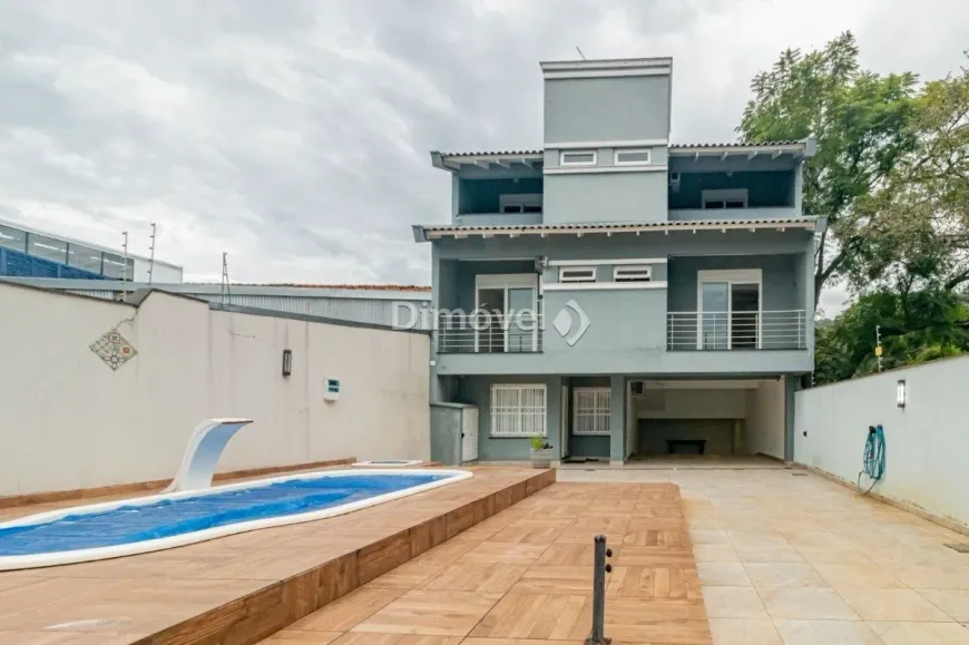 Foto 1 de Casa com 4 Quartos para alugar, 370m² em Nonoai, Porto Alegre