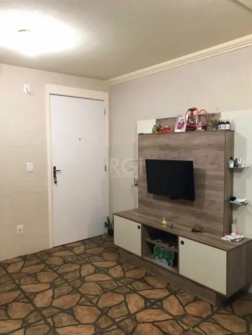 Foto 1 de Apartamento com 2 Quartos à venda, 43m² em Vila Nova, Porto Alegre