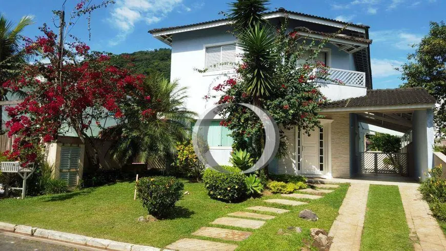 Foto 1 de Casa de Condomínio com 5 Quartos à venda, 285m² em Balneário Praia do Pernambuco, Guarujá