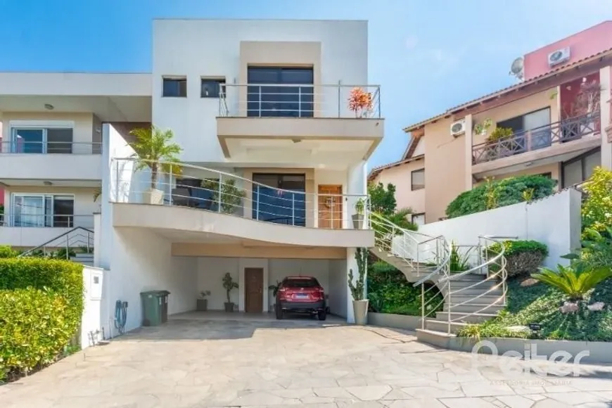 Foto 1 de Casa de Condomínio com 3 Quartos à venda, 235m² em Hípica, Porto Alegre