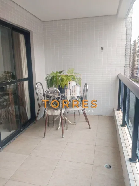 Foto 1 de Flat com 2 Quartos à venda, 65m² em Praia das Pitangueiras, Guarujá