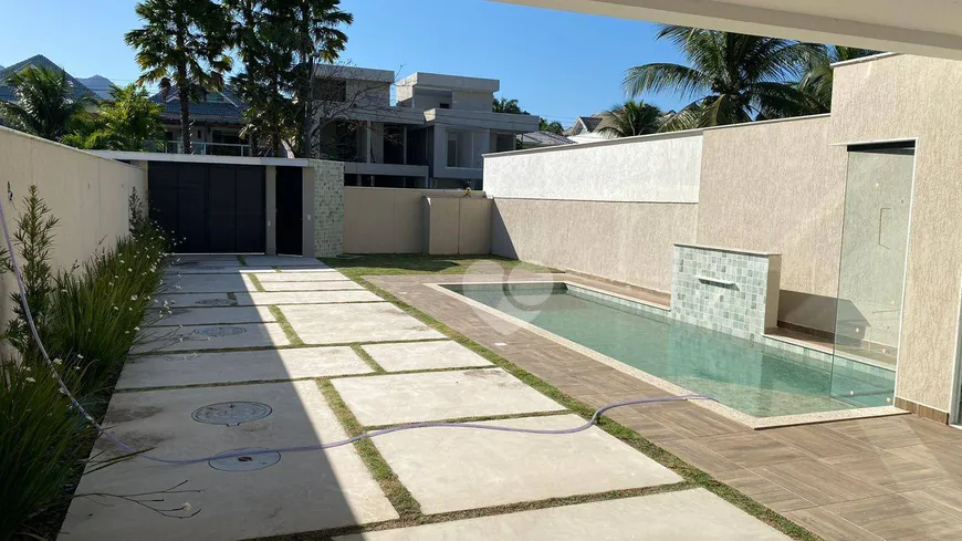 Foto 1 de Casa de Condomínio com 5 Quartos à venda, 370m² em Barra da Tijuca, Rio de Janeiro