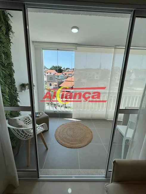 Foto 1 de Apartamento com 2 Quartos à venda, 57m² em Jardim Vila Galvão, Guarulhos