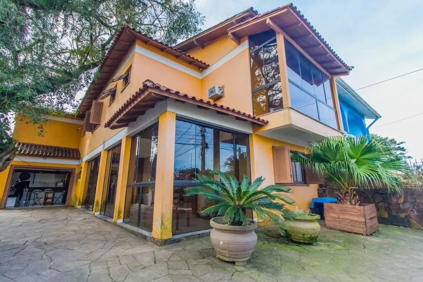 Foto 1 de Casa com 4 Quartos à venda, 261m² em Santa Isabel, Viamão