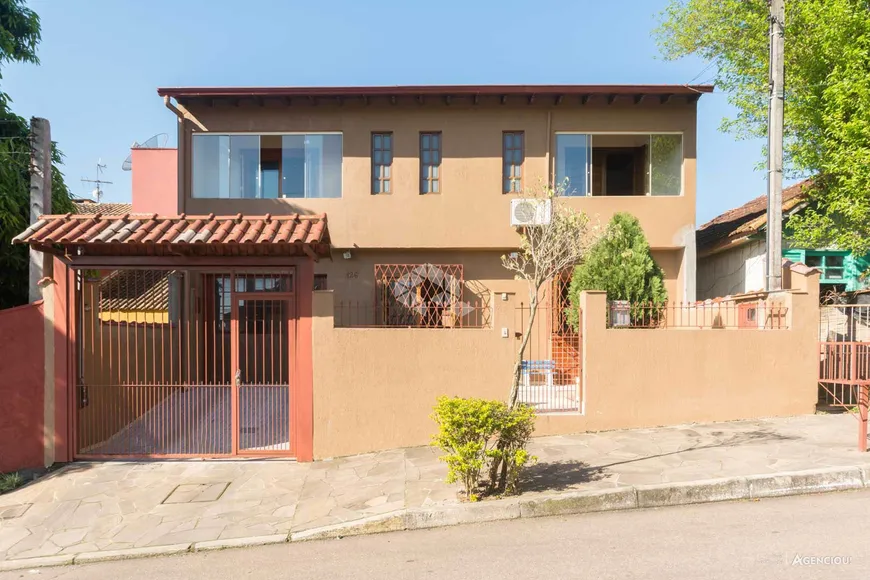 Foto 1 de Casa com 4 Quartos à venda, 270m² em Cavalhada, Porto Alegre