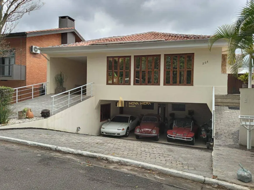 Foto 1 de Casa de Condomínio com 4 Quartos para venda ou aluguel, 430m² em Alphaville, Santana de Parnaíba