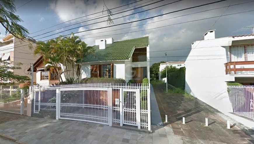 Foto 1 de Casa com 3 Quartos à venda, 381m² em Jardim Lindóia, Porto Alegre