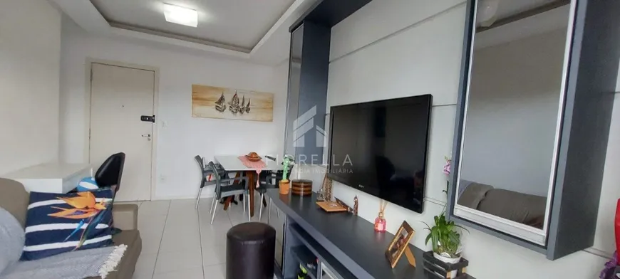 Foto 1 de Apartamento com 2 Quartos à venda, 63m² em Barreiros, São José