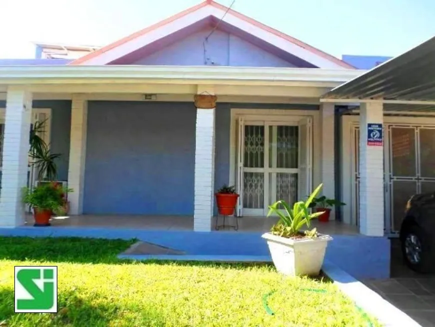 Foto 1 de Casa com 5 Quartos à venda, 289m² em Cavalhada, Porto Alegre