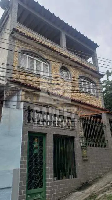 Foto 1 de Casa de Condomínio com 5 Quartos à venda, 250m² em  Vila Valqueire, Rio de Janeiro