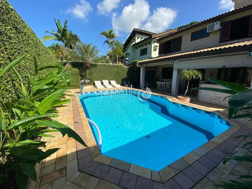 Foto 1 de Casa de Condomínio com 4 Quartos à venda, 247m² em Balneário Praia do Pernambuco, Guarujá