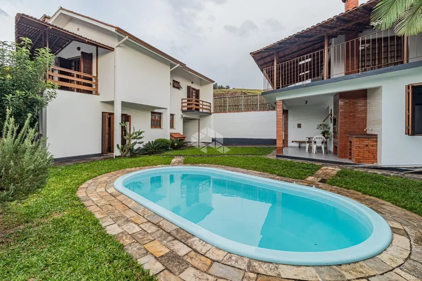 Foto 1 de Casa com 3 Quartos à venda, 265m² em Nonoai, Porto Alegre