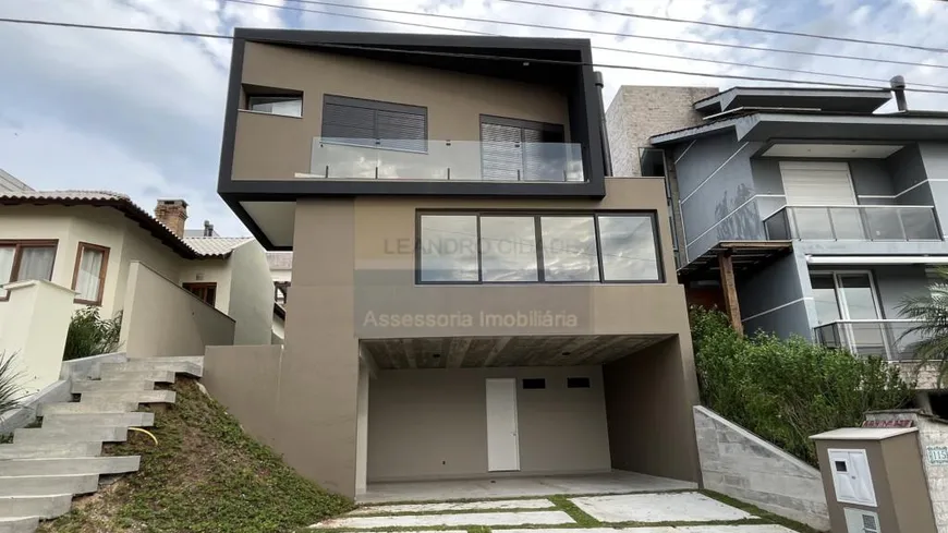 Foto 1 de Casa de Condomínio com 3 Quartos à venda, 235m² em Condominio Buena Vista, Viamão