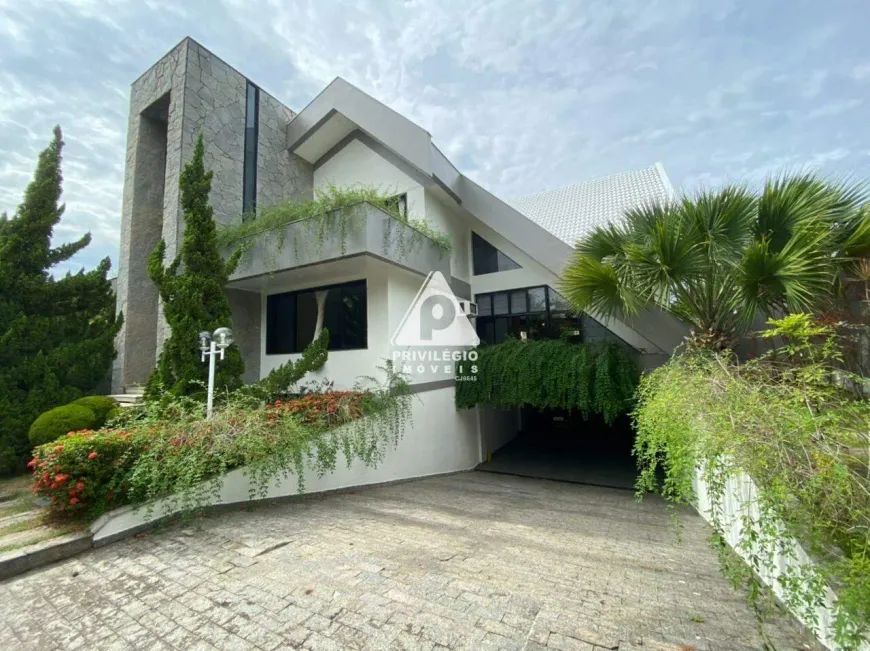 Foto 1 de Casa de Condomínio com 4 Quartos à venda, 872m² em Barra da Tijuca, Rio de Janeiro