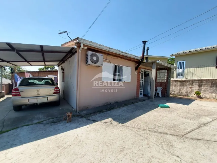 Foto 1 de Casa com 2 Quartos à venda, 60m² em Agronomia, Porto Alegre