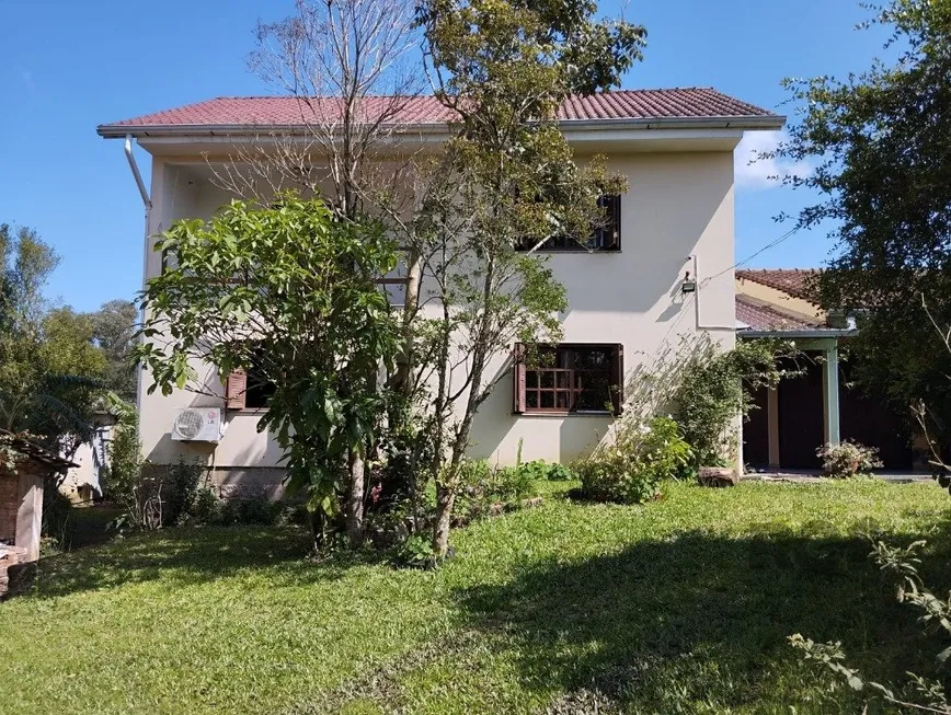 Foto 1 de Casa com 4 Quartos à venda, 241m² em Lageado, Porto Alegre