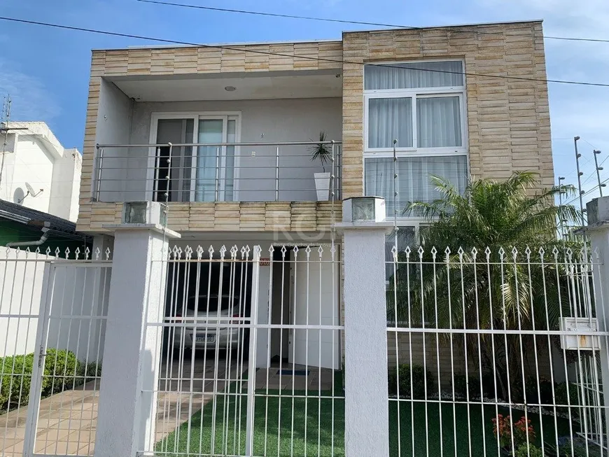 Foto 1 de Sobrado com 4 Quartos à venda, 241m² em Harmonia, Canoas