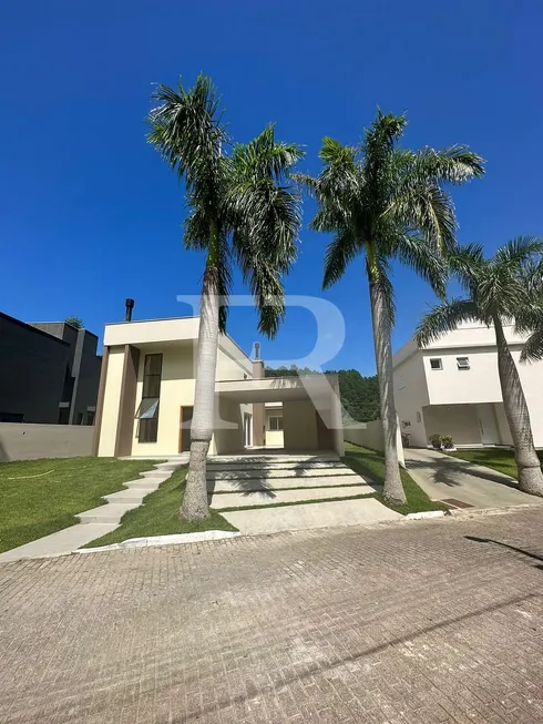 Foto 1 de Casa de Condomínio com 3 Quartos à venda, 189m² em Cachoeira do Bom Jesus, Florianópolis