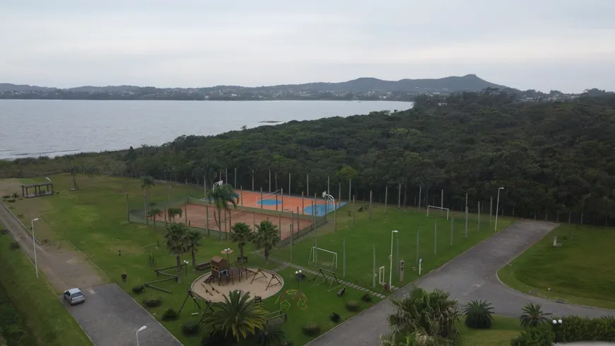 Foto 1 de Lote/Terreno à venda, 1043m² em Praia do Rosa, Imbituba