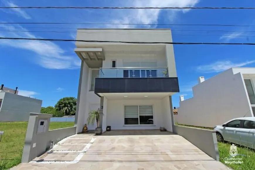 Foto 1 de Casa de Condomínio com 3 Quartos à venda, 204m² em Hípica, Porto Alegre
