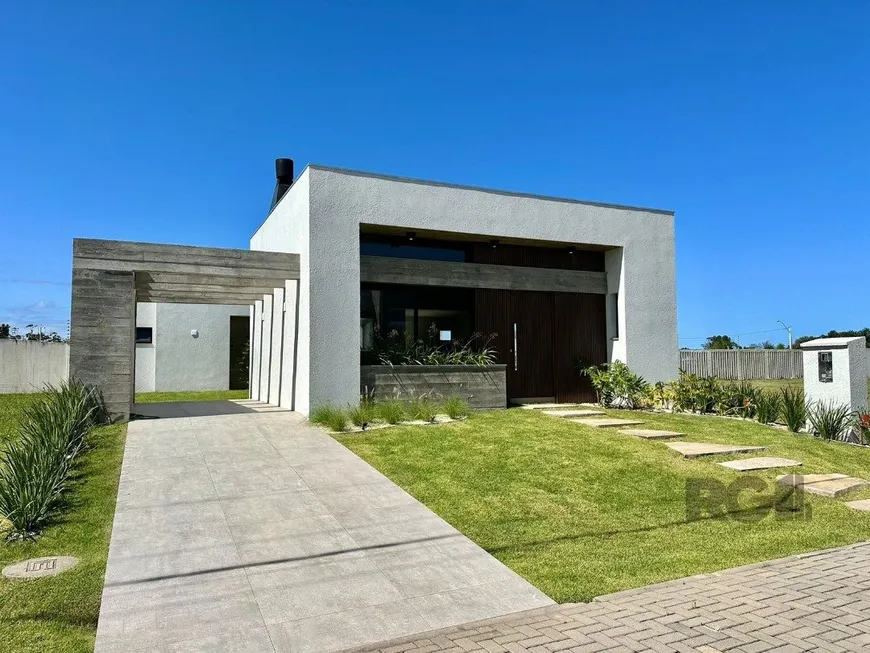 Foto 1 de Casa de Condomínio com 4 Quartos à venda, 168m² em Arroio Teixeira, Capão da Canoa