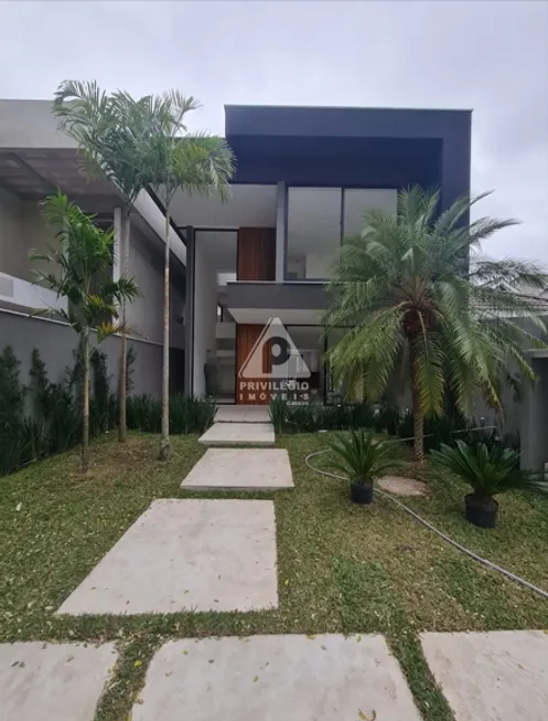 Foto 1 de Casa com 4 Quartos à venda, 350m² em Barra da Tijuca, Rio de Janeiro