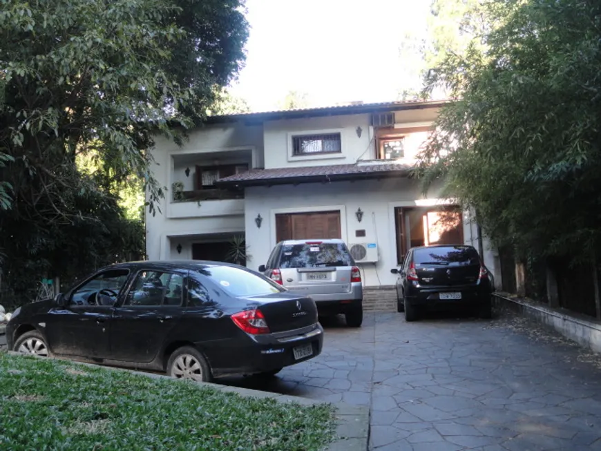 Foto 1 de Casa com 5 Quartos para alugar, 598m² em Auxiliadora, Porto Alegre