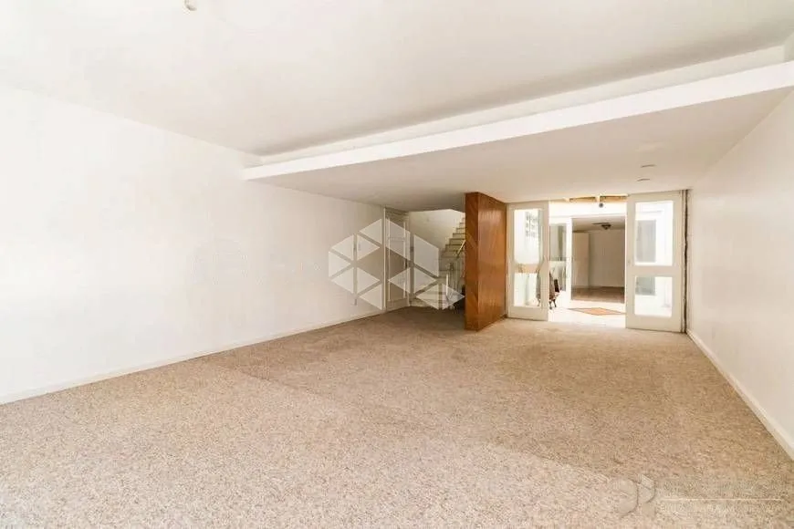 Foto 1 de Casa com 4 Quartos à venda, 175m² em Rio Branco, Porto Alegre