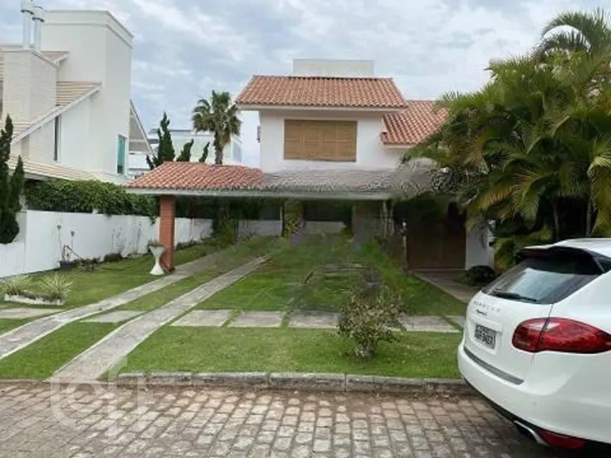 Foto 1 de Casa com 5 Quartos à venda, 236m² em Jurerê Internacional, Florianópolis