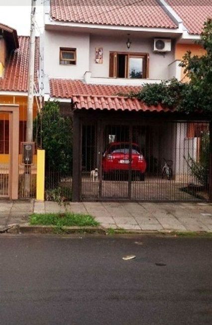 Foto 1 de Sobrado com 3 Quartos à venda, 164m² em Guarujá, Porto Alegre